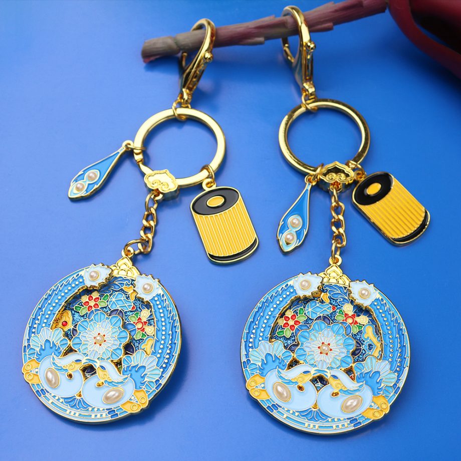 Cultural and creative flowing gold enamel keychain