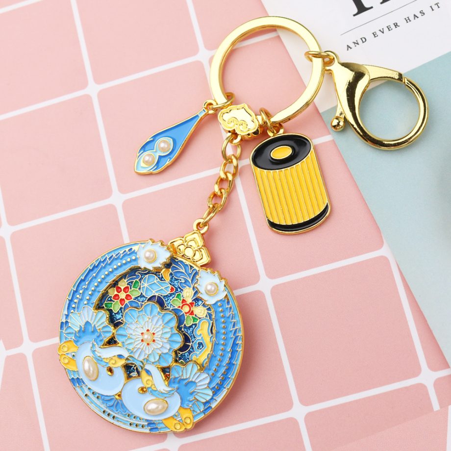 Cultural and creative flowing gold enamel keychain